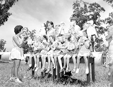Outdoor children's activities at the Villawood Migrant Centre, 1956. Courtesy National Archives of Australia