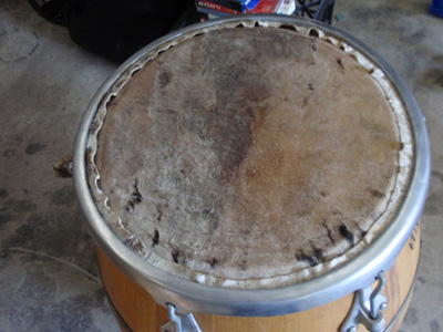 Cowhide stretched on a Uruguayan drum with new tension fittings.