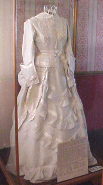 Silk wedding gown, c.1874. 