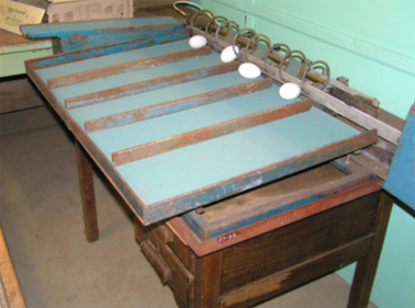 Egg sorting table c.1920 - 30s, Photograph Wollondilly Heritage Centre