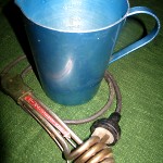 "I had a little Tauchsieder to make hot water for our coffee. You immerse this electric prong into a jug of water and it heats it up. The Tauchsieder came from Germany in my glory box. I bought the blue aluminium jug in Albury in 1959."