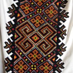 "I embroidered the orange and white blouse; it is traditional Ukrainian embroidery but done in colours that I like. The other blouse [is unique]; I never saw it anywhere except in my village."