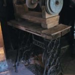 The Graham brothers lived in the Heritage Cottage for 40 years. The New Zealander men adapted this Singer treadle to run the wheels for rubbing down opal. Photograph Lightning Ridge Historical Society