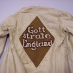 Holsworthy internees coat with ‘God punish England’ sewn on to the back. Australian War Memorial collection