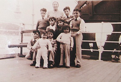 Joe’s mother Josephine and Borg and Vassallo children en route to Australia on the Ocean Victory, February 1950. Joe Borg is standing on the left. His future wife, Annie Vasallo, is crouching at the front