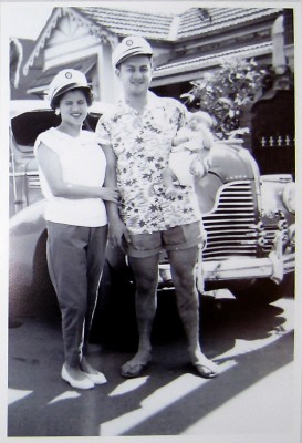 Annie and Joe Borg with newly-born son, Stephen, in front of 1940 Buick car outside their first home, Kepos St, Redfern, Sydney, Australia, 1960