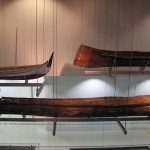 An Aboriginal dugout canoe (front), Aboriginal bark canoe (right) and a Indonesian kids canoe (left) on display at the Western Australian Maritime Museum. Photograph Stephen Thompson