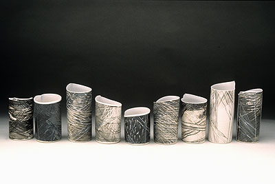Nine ceramic cylinders