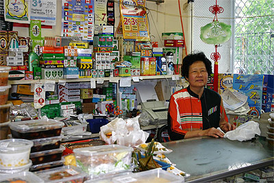 Woman in her shop at 'Thaitown''