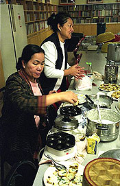 Women cooking Thai snacks at Wat Buddharangsee