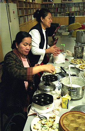 Women cooking Thai snacks
