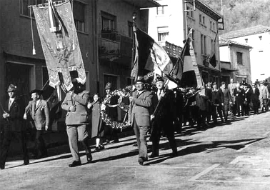 Pietro Berton in an Alpini street march, undated.