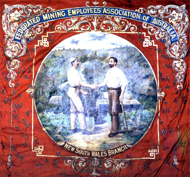 Mining Federation banner circa 1912- 1915. This banner dates from when coal miners unions in regional NSW merged to form a single state union. Image courtesy Sydney Trades Hall Association 