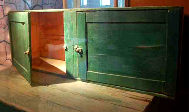 Shoe cupboard made from packing crates.