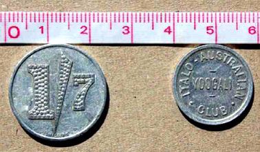 Drink tokens, large (23mm diameter) token on left.