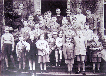 Fairbridge leaving party, Knockholt, Kent, England, 5 February 1955 ('Smiley' is third left, middle row.)