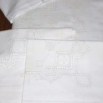 "The sheet set was made in 1945 and was a wedding gift to my mother from her mother. My mother hand-embroidered them in a 1880s style for my glory box in 1969."