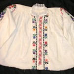 "At the age of three, when we fled from Yugoslavia, I [wore] a traditional Serbian blouse and skirt that my mother had made and embroidered for me. I still have the blouse today."