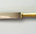 "This is the last remaining piece of my cutlery set which I received as a wedding gift before we left Italy. After Bonegilla I only have one knife left now – you see, I lent them out to other people at Bonegilla and they did not come back. It was a 24 piece set: six knives, spoons, forks and teaspoons. Sometimes I wonder where all those cutlery pieces ended up!"