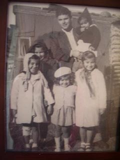 "This photo is of my family in front of our first home at Yarra Bay, Sydney."