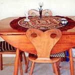 "My husband Ted made this small, round dining table with four matching chairs with heart-shaped backs in a European style with leaves on the table so it could be extended. He had to make it quickly because we were loaned a table and the people were moving to Melbourne and wanted it back."