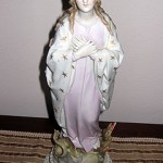 "The statue is made of hand-painted fine bone china. It was acquired in Italy in the 1850s and passed on to me through my husband's grandmother and mother. It was a wedding gift to his grandmother from the local friars."