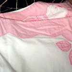 "I made these sheets with pink edging by hand in Sardinia as part of my glory box. It would have taken a month to make. I would sit outside with my family and ladies next door, and do my sewing."