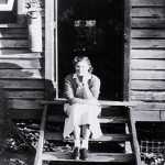 "This is me at 17 years old, wearing my nurse's uniform, sitting on the steps of my accommodation at the Bonegilla hospital."