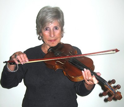 "This violin belonged to Dad [who] was a musician. At home, I used to lie in bed and request songs on the violin and my dad would play them for me. I would love lying in bed and listening." 