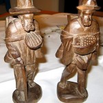 "These are hand carved from wood and represent men who went from town to town in Chile searching for work. We call them arrieros."