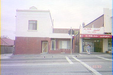 Al-Nur Salon at 205 Lakemba Street, Lakemba. The double storey building on the left is 209 Lakemba Street, Lakemba, 1990