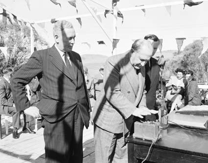 Prime Minister Ben Chifley and Governor- General McKell launched the Snowy Mountains Hydro-Electric Scheme with a blast. 17th October 1949. The scheme was a partnership between New South Wales, Victoria and the Commonwealth governments. Courtesy National Archives of Australia.