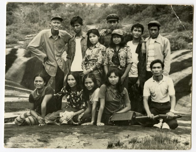 Voradeth (middle, back row) on an outing with friends, Vientiane 1978