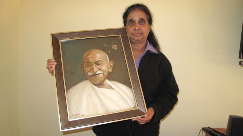 Padma with her father’s painting of Gandhi