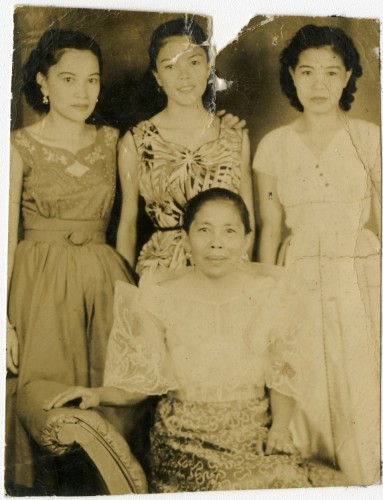 Josie’s grandmother (seated) and her mother (far right): ‘When I first left the Philippines in the 1980s, I was given a lot of photos of my family, of my extended family by my mother. So I brought them with me, and I used to look at them all the time …’