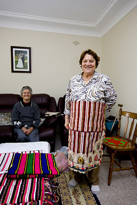 Photo: Spasija models the aprons in her home in Coniston